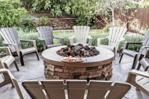 Custom backyard fire pit installation in Seattle WA by Green Spaces Landscaping